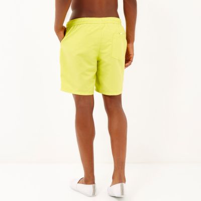 Bright yellow drawstring swim shorts